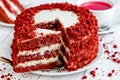 Red velvet cake, classic three layered cake from red butter sponge cakes with cream cheese frosting Royalty Free Stock Photo