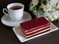 Red velvet cake and a cup of tea Royalty Free Stock Photo