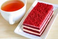 Red velvet cake and a cup of tea Royalty Free Stock Photo