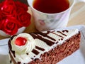 Red velvet cake and a cup of tea Royalty Free Stock Photo