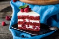 Red velvet cake on wood board. Slice of cake. Raspberry cake. Devil`s cake. Wedding dessert. Birthday cake. Delicious Royalty Free Stock Photo