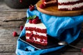 Red velvet cake on wood board. Slice of cake. Raspberry cake. Devil`s cake. Wedding dessert. Birthday party. Delicious dessert. Royalty Free Stock Photo