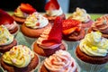 Red velvet cup cakes with white and rose topping Royalty Free Stock Photo