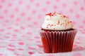 Red velvet cupcake on pink and white background Royalty Free Stock Photo