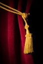 Red velvet curtain with tassel Royalty Free Stock Photo