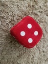 Red Velvet dice with number four to play