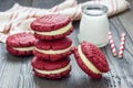 Red velvet sandwich cookies and milk