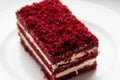 Red velvet slice of cake on white plate Royalty Free Stock Photo
