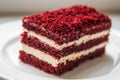 Red velvet slice of cake on white plate Royalty Free Stock Photo