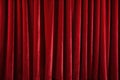 red velvet theater curtain closed, edge to edge Royalty Free Stock Photo