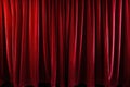 red velvet theater curtains close up with glowing lights Royalty Free Stock Photo