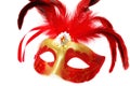 Red Venetian Carnival mask with feathers on the white Royalty Free Stock Photo