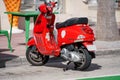 Red Vespa motor scooter photo