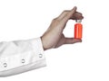 Red vial on a hand