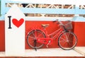 Red vintage bicycle with I Love paint Royalty Free Stock Photo