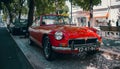 Red vintage car in the middle of lisboa