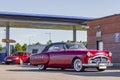 Red vintage car parked at Statoil gas station in Sweden Royalty Free Stock Photo