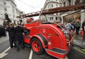 Vintage fire engine and firefighters on display in Regent Street , London