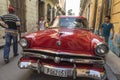 Red vintage Ford taxi Old Havana