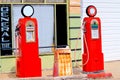 Vintage gas pumps with antique globes. Royalty Free Stock Photo