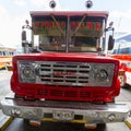 Red vintage GMC bus in Medellin, Colombia