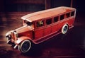 Red vintage toy truck on dark wooden table Royalty Free Stock Photo