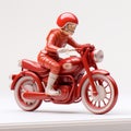 Artgerm-inspired Toy Model Man On Red Motorcycle Royalty Free Stock Photo