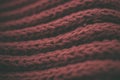 Red vintage knitted fabric texture and background for designers. Vintage knitted background. Close up view of red abstract texture Royalty Free Stock Photo