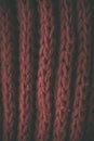 Red vintage knitted fabric texture and background for designers. Vintage knitted background. Close up view of red abstract texture Royalty Free Stock Photo