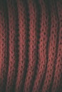 Red vintage knitted fabric texture and background for designers. Vintage knitted background. Close up view of red abstract texture Royalty Free Stock Photo