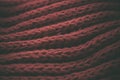 Red vintage knitted fabric texture and background for designers. Vintage knitted background. Close up view of red abstract texture Royalty Free Stock Photo