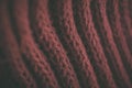 Red vintage knitted fabric texture and background for designers. Vintage knitted background. Close up view of red abstract texture Royalty Free Stock Photo