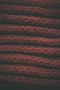 Red vintage knitted fabric texture and background for designers. Vintage knitted background. Close up view of red abstract texture Royalty Free Stock Photo