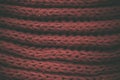 Red vintage knitted fabric texture and background for designers. Vintage knitted background. Close up view of red abstract texture Royalty Free Stock Photo