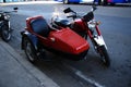 Red vintage motorcycle with sidecar