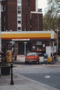 Red vintage old Fiat on the gas station Royalty Free Stock Photo