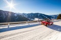 Vintage racing car driving classic rally on snow covert road Royalty Free Stock Photo