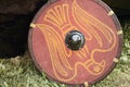 Red vintage shield with with the phoenix bird a medieval warrior. Recon