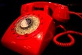 Red vintage telephone isolated on black background.Old fashioned red phone on background.classic red telephone Royalty Free Stock Photo