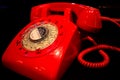 Red vintage telephone isolated on black background..Old fashioned red phone on background.classic red telephone Royalty Free Stock Photo