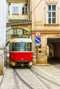 Red vintage tram in the old streets of Prague Royalty Free Stock Photo