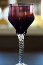 Red vintage wine glass close-up. antique wine glass. Royalty Free Stock Photo