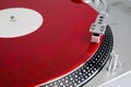 Red vinyl record on the player Royalty Free Stock Photo