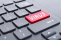 Red virus button on keyboard concept Royalty Free Stock Photo