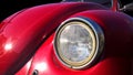 Red Volkswagen beetle car - front view Royalty Free Stock Photo