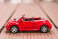 Red Volkswagen Beetle toy car Royalty Free Stock Photo