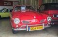 Red Volkswagen Karmann Ghia in museum Royalty Free Stock Photo