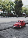 Red Volkswagen miniature near ngawi mainstreet Royalty Free Stock Photo