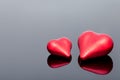 Red volumetric couple hearts the symbol of love.