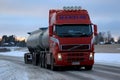 Red Volvo FH Tank Truck Delivers at Dusktime Royalty Free Stock Photo